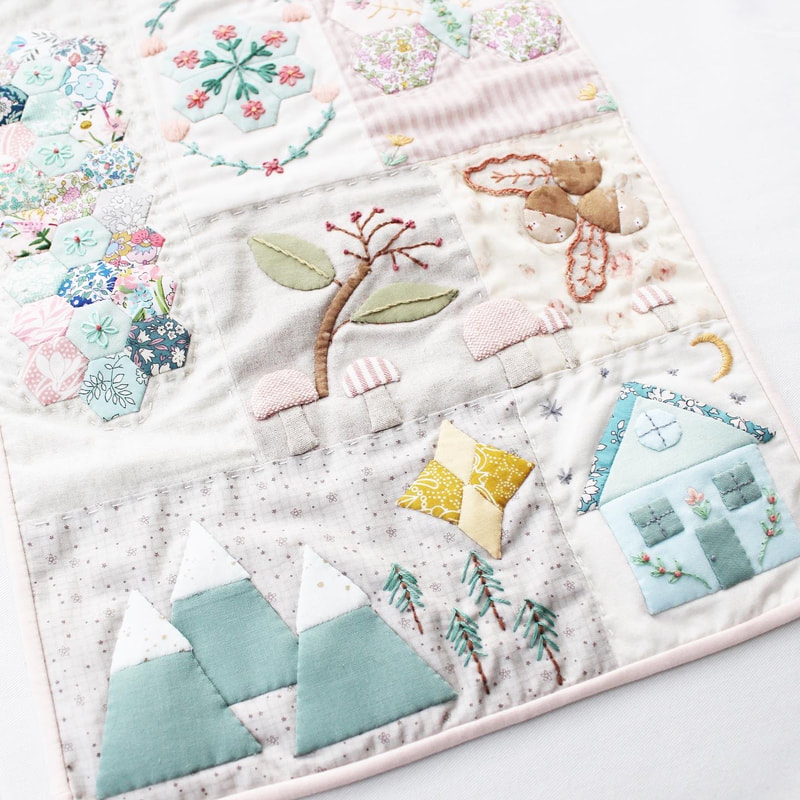 seasonal sampler mini quilt